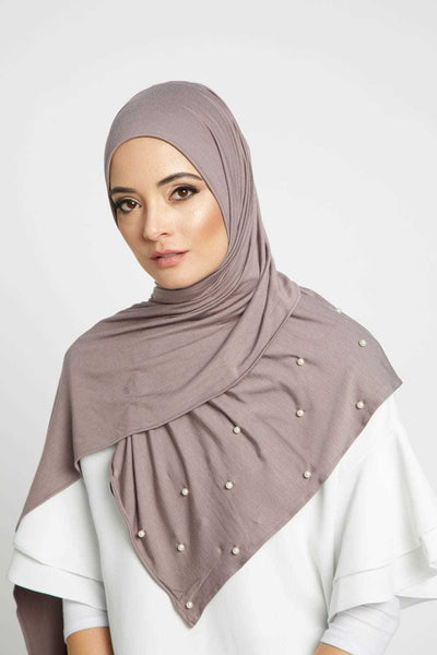 woman wearing pale purple hijab