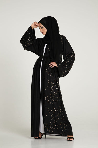 woman wearing black open abaya