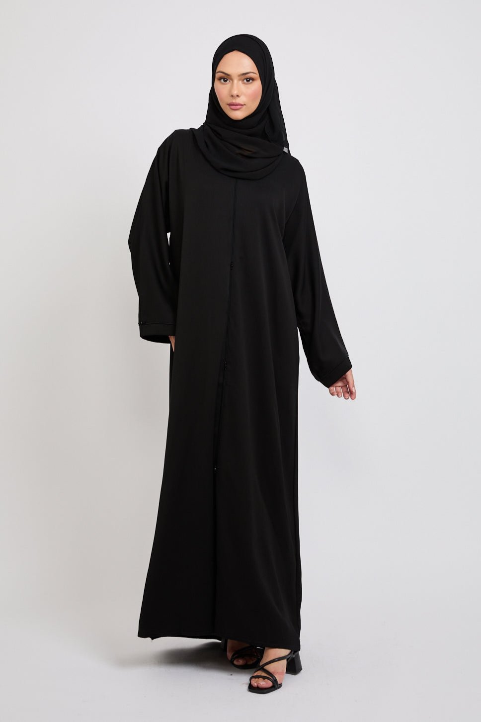 Closed Textured Abaya With Dainty Detailing Black AbayaButh closed-textured-abaya-with-dainty-detailing-black-abayabuth