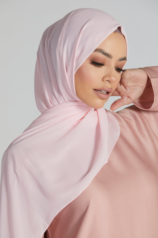 https://abayabuth.com/cdn/shop/products/geogette-chiffon-pink-hijab-006_480x480@2x.jpg?v=1665933220
